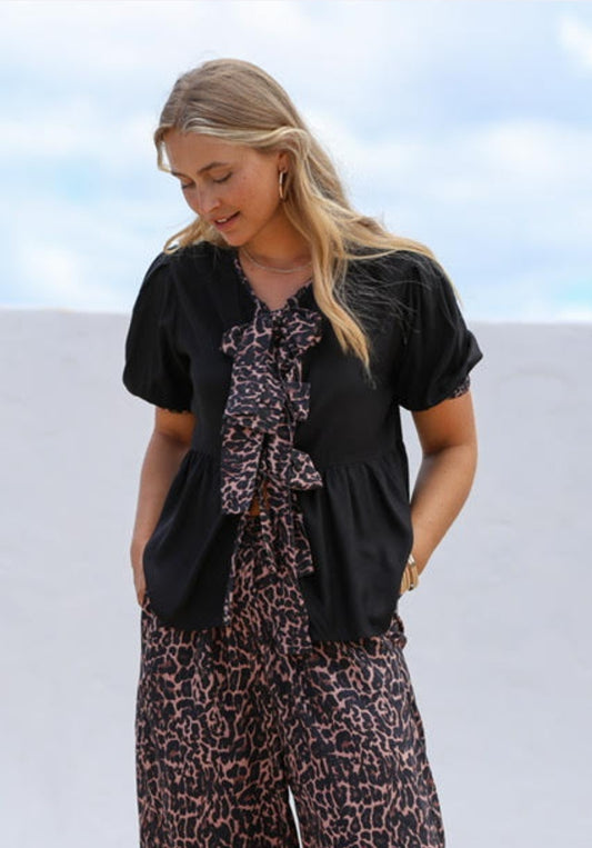 Black top with leopard bow